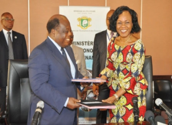 Le Premier ministre, ministre de l’Economie et des Finances, Daniel Kablan Duncan et Bouréima Badini.