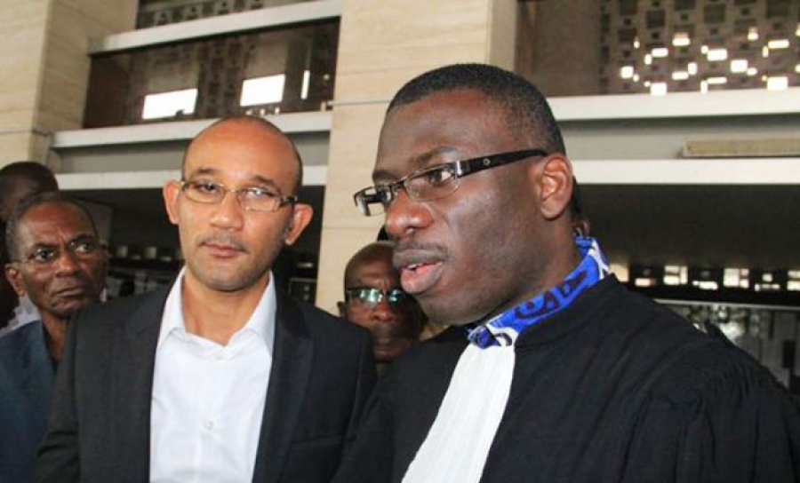 De gauche à droite, Michel Gbagbo et son avocat Me Ange Rodrigue Dadjé.