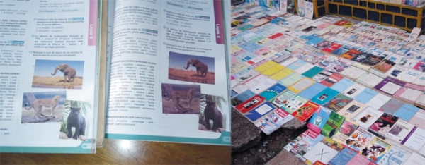Deux livres scolaires. Celui de droite est contrefait avec des illustrations foncées. En plus de mettre à mal l'économie, les produits chimiques utilisés dans la contrefaçon nuisent gravement à la santé des élèves.t