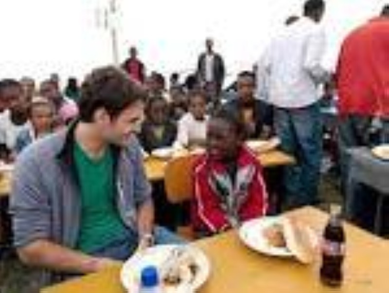 Roger Federer avec des enfants
