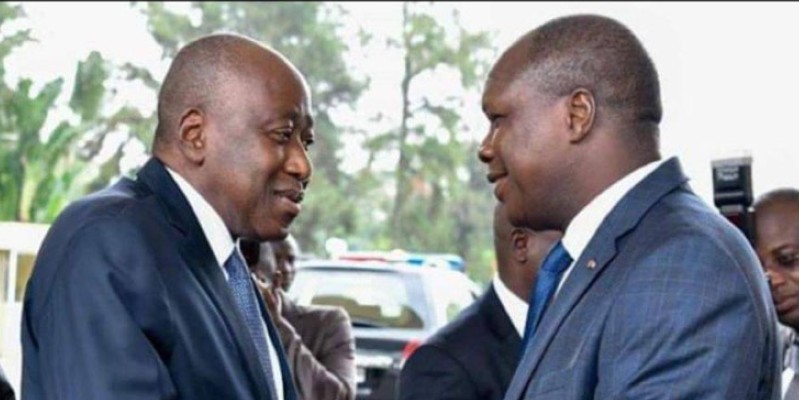 Le ministre Mabri Toikeusse aux côtés du chef du gouvernement. (Dr)