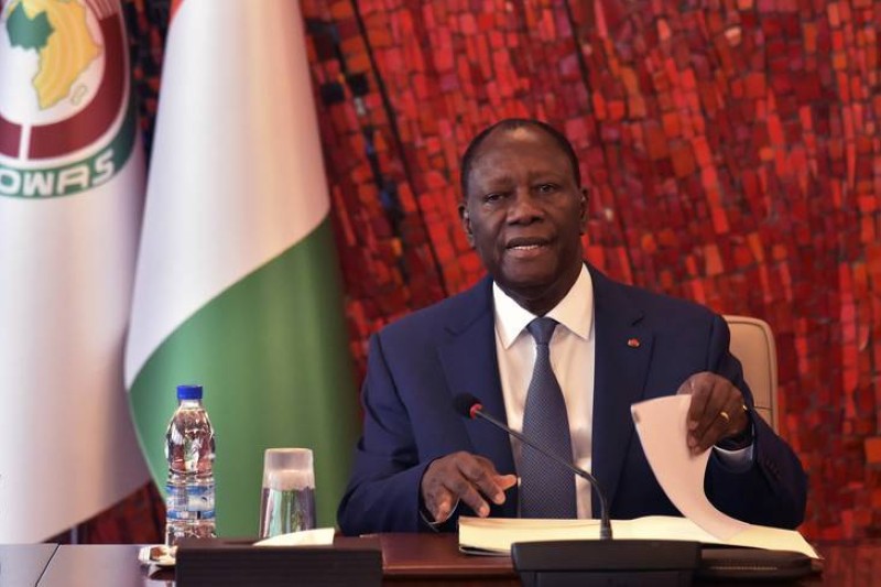Ivorian President Alassane Ouattara attends a meeting of the National Security Council at the Presidential Palace in Abidjan following the outbreak of the COVID-19 (new Coronavirus) on March 16, 2020. - Ivory Coast closed on march 16 its borders to all non-Ivorian citizens as well as its schools and universities. (Photo by SIA KAMBOU / AFP)