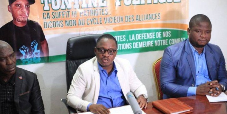 Johnson Adiko (au centre), président de la Coalition patriotique pour l’émergence (Cpe). (Dr)