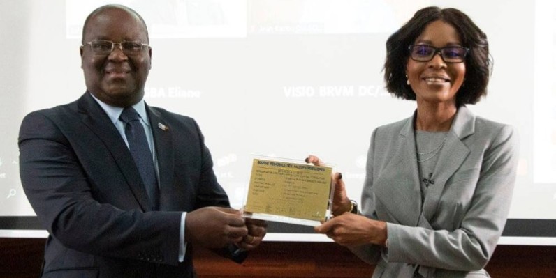 Dr Edoh Kossi Amenounvé (Dg Brvm) et Mme Janine Kacou Diagou (Dg Groupe Nsia). (DR)