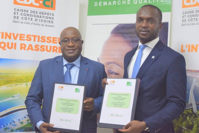 Lassina Fofana (Dg de la CDC-CI) et Fadiga Youssouf (Dg de la BNI)