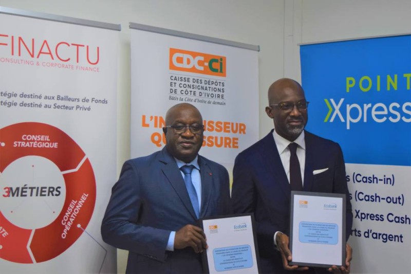 Lassina Fofana (Dg de la CDC-CI) et Paul Harry Aithnard (Dg Ecobank-Côte d’Ivoire)