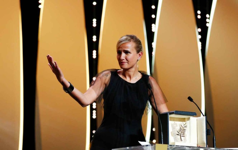The 74th Cannes Film Festival - Closing ceremony - Cannes, France, July 17, 2021. Director Julia Ducournau, Palme d'Or award winner for the film "Titane", gestures. REUTERS/Johanna Geron