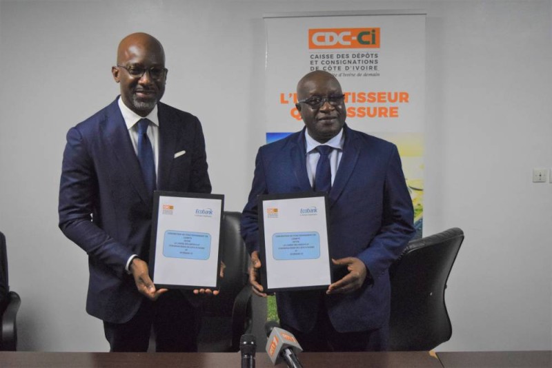 
Le Dg de la Cdc-Ci, Lassina Fofana et le Dg d’Ecobank-CI Paul Harry Aithnard (Dr)
