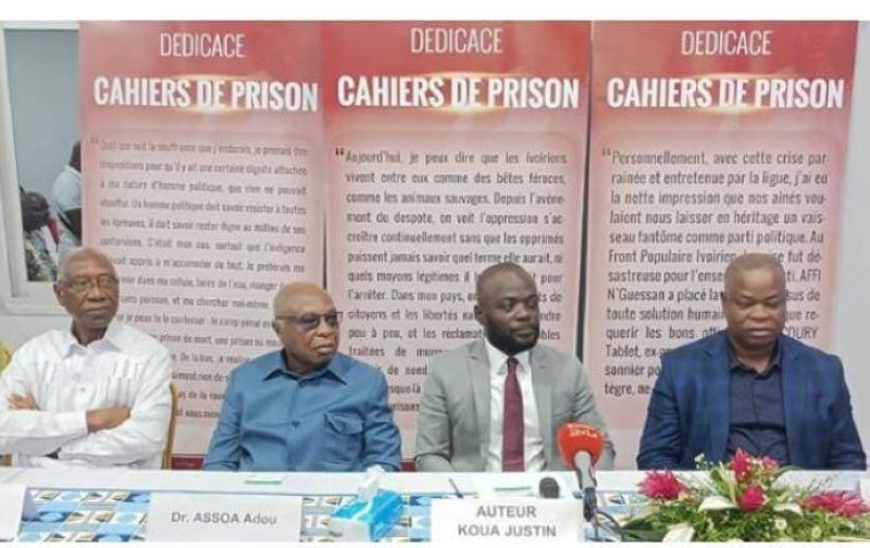 Des responsables du Ppa-ci autour de l’auteur des « Cahiers de prison », Justin Koua