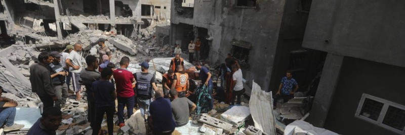 Des Palestiniens dans un camp de réfugiés dans la Bande de Gaza AP