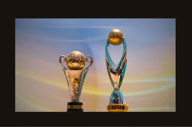 Les trophée de la Ligue des champions et de la  coupe de la confédération 