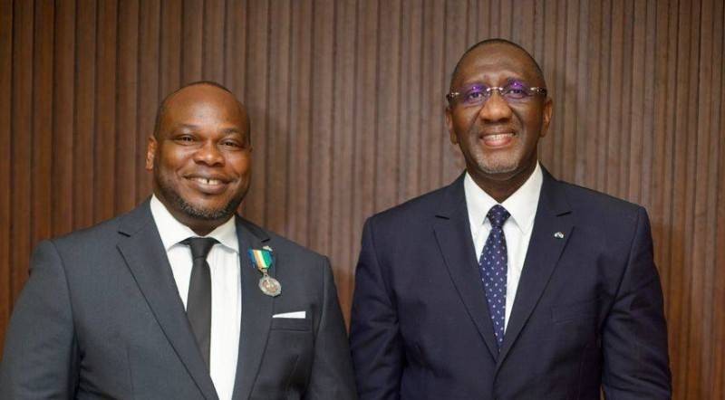 Ange Frederick Balma aux côté du ministre Souleymane Diarassouba