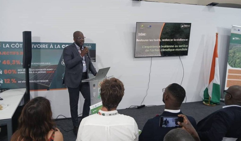 Jean-Yves Kpalou, conseiller technique du ministre des Eaux et Forêts et coordonnateur du Prdf-CI, a fait une présentation du projet, sur le pavillon de la Côte d’Ivoire. (F.E)